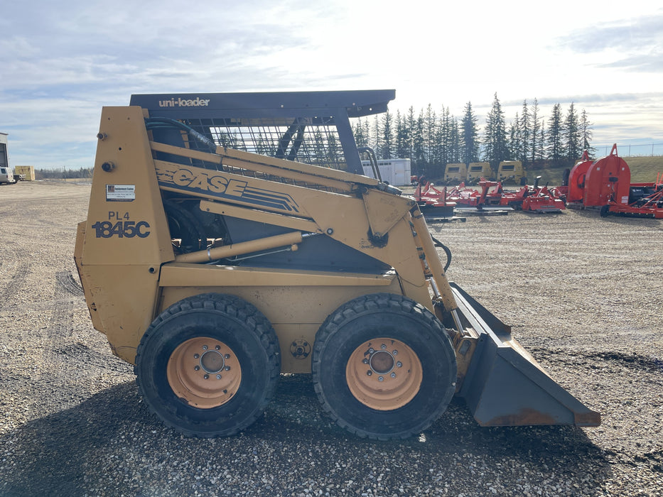1997 Case 1845C skid steer with bucket