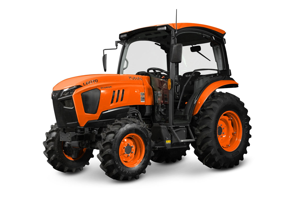 Kubota L6070 ProCab compact tractor, studio photo facing left