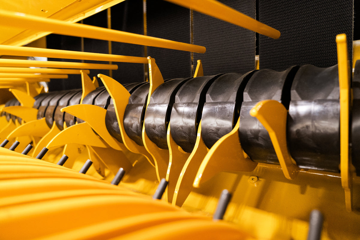 Vermeer 605S Rancher round baler rotor and pickup close-up