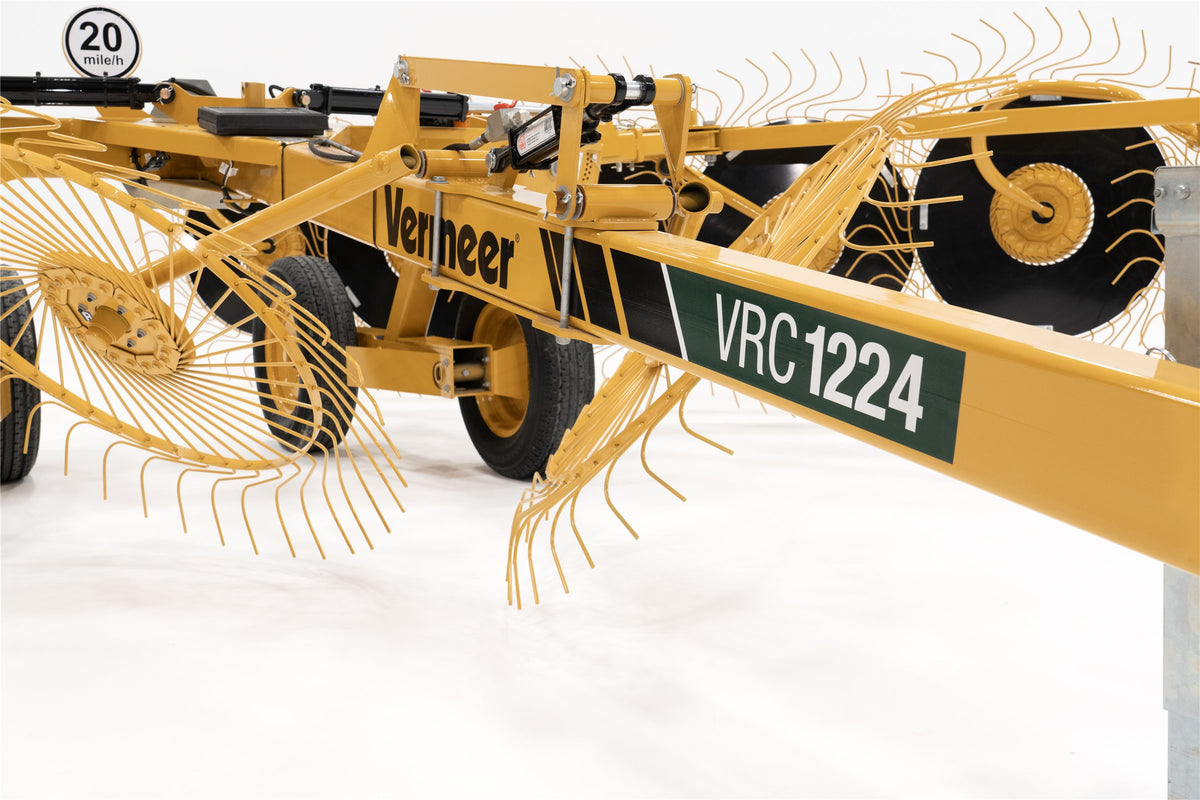The VRC1224's frame with its Vermeer and VRC1224 decals, rake wheels and a 20 mph sign